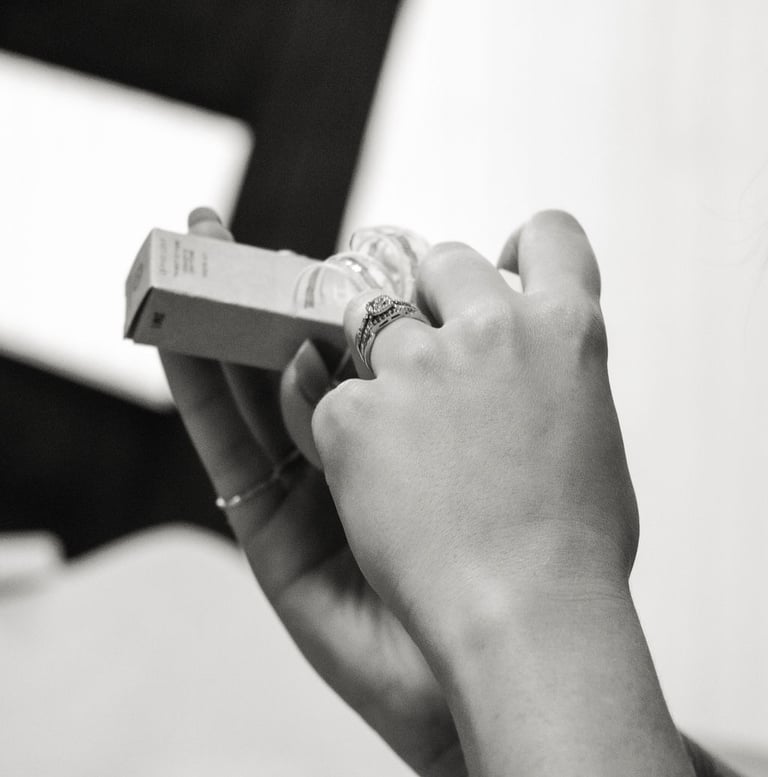black and white close up shot of bride's hands with wedding band