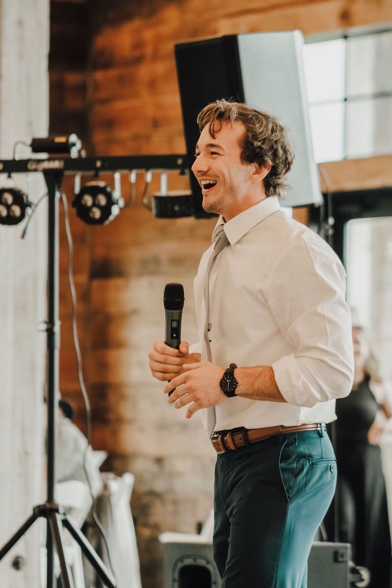groomsman making a speech during reception