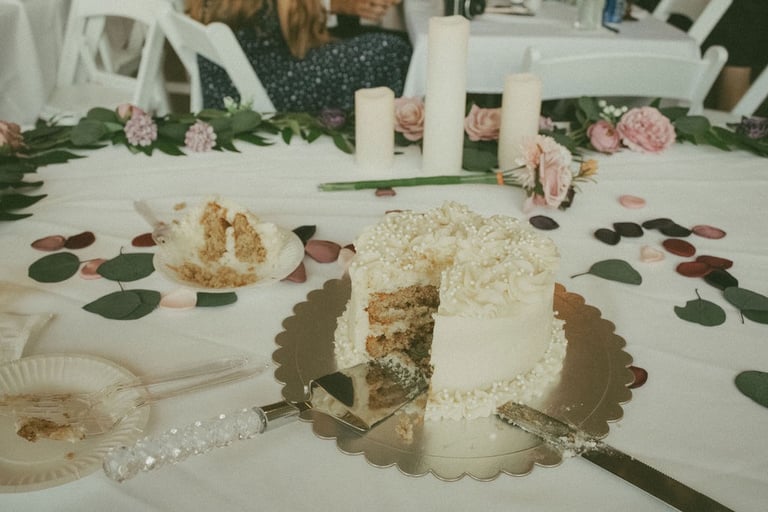 detail candid shot of wedding cake after first cut