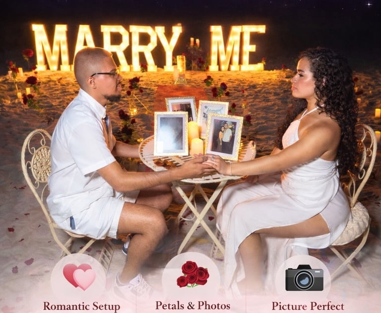 Couple holding hands at a romantic beach marriage proposal with light-up Marry Me letters at Daytona