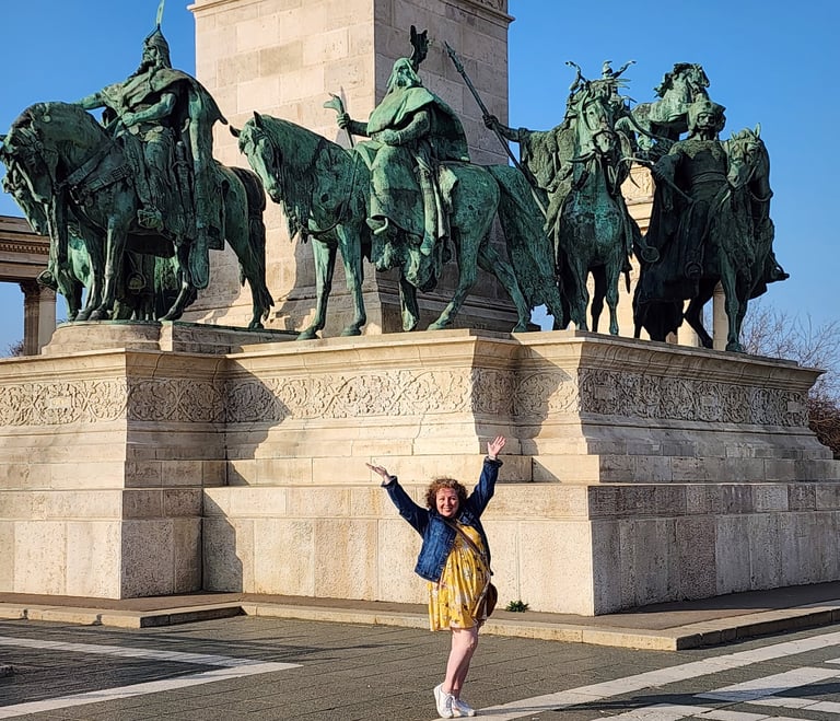 Amy in front of the Hero Square statue