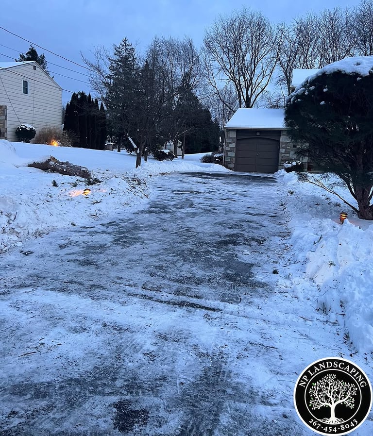 excellent landscaping and hardscaping of grass, stones and trees by NP Landscaping