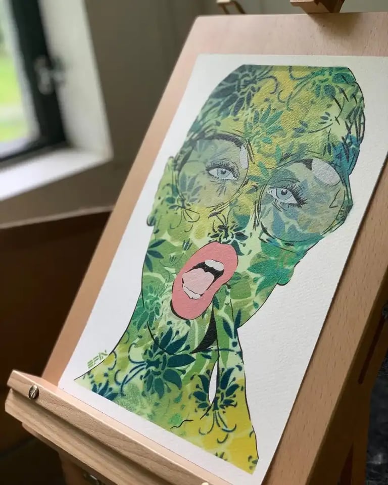 Efin art on display stand