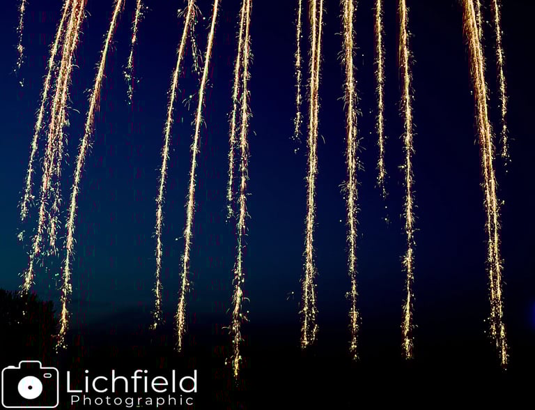 A Light trail of falling fireworks