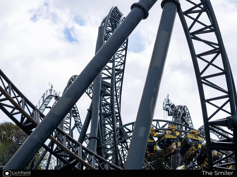 The SMiler rollercoaster track with cart in the background