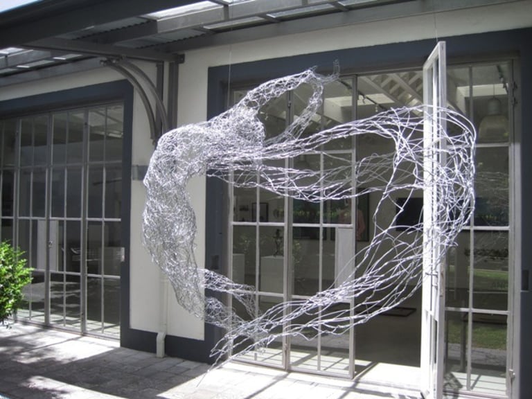 Wire sculptue of angel with wings exhibited at Grande Provence Art Gallery