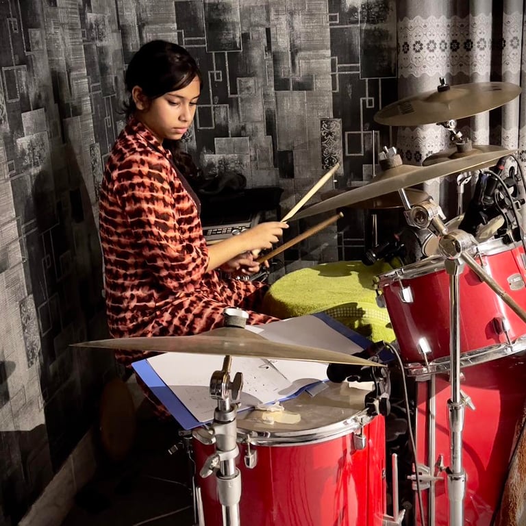 A drum student at ASEIS studio