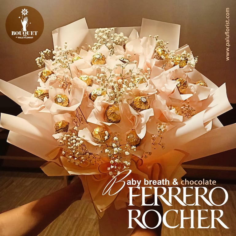 Elegant Ferrero Rocher chocolate bouquet with white baby's breath flowers and light pink wrapping.