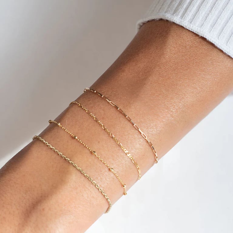 Permanent jewelry at The Cure Nail Lounge