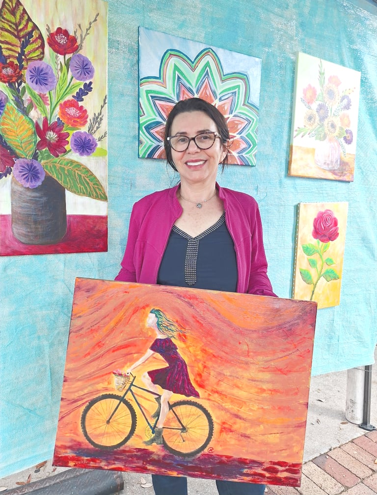 woman holding bicycle art