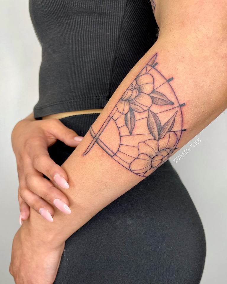 Fineline fan with peonies tattoo design on forearm 