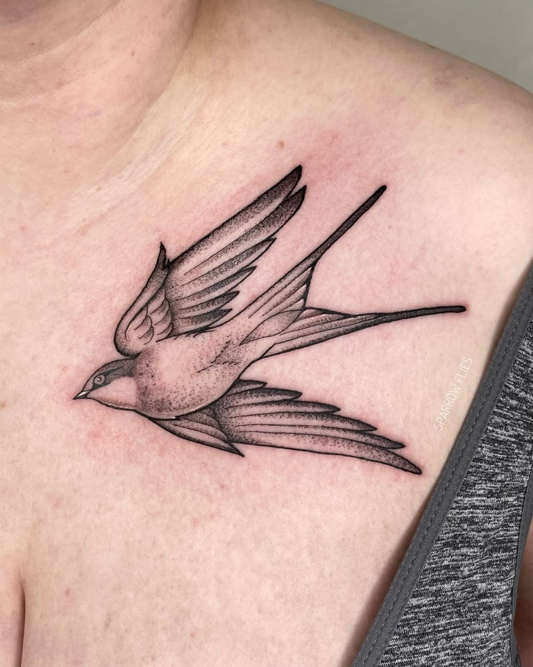 Swallow tattoo design on the chest
