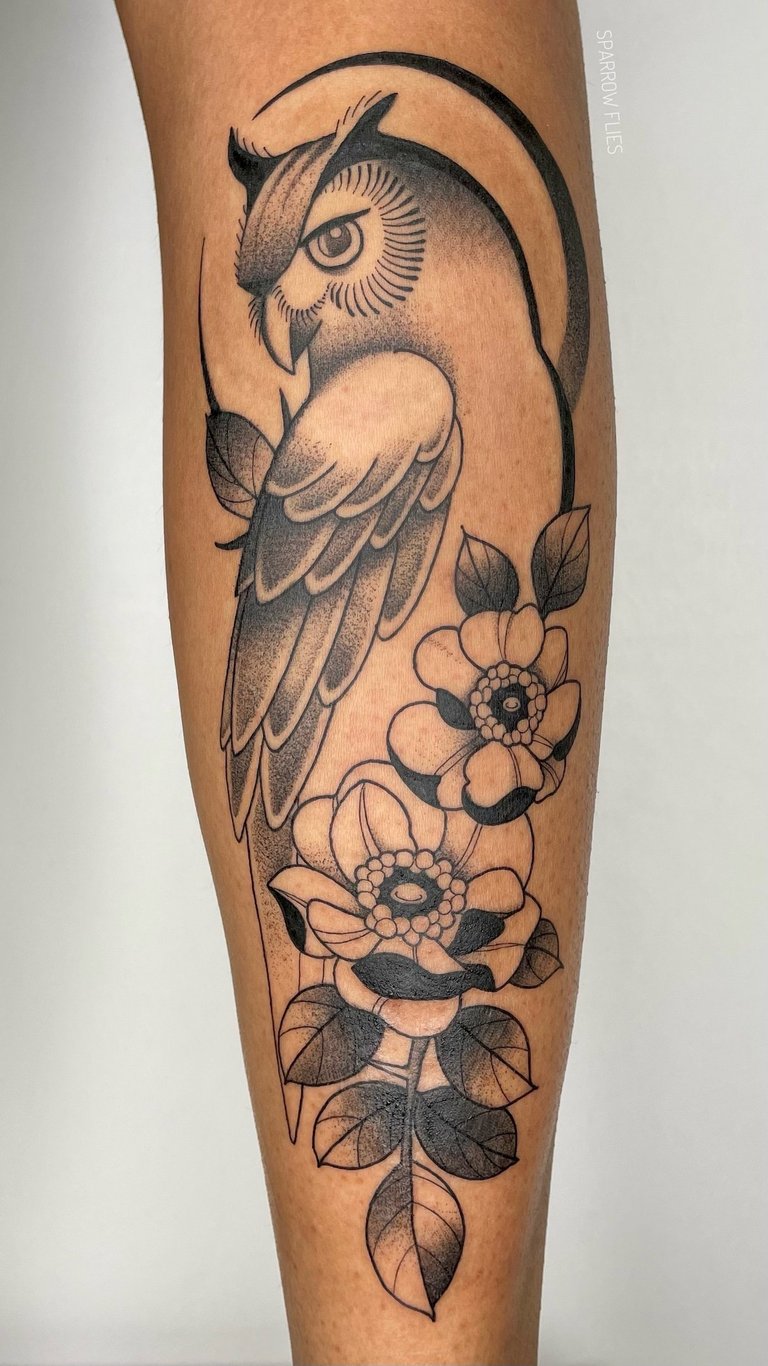 Neo-traditional owl and wild roses tattoo design on the shin
