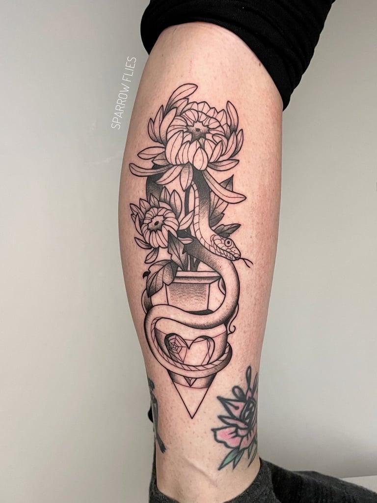 Neo-traditional snake and chrysanthemums  with broken vase tattoo