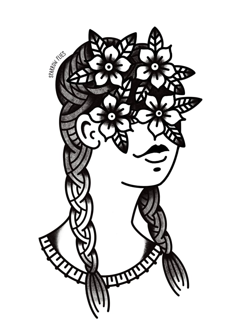 Old school woman with flowers on her eyes tattoo