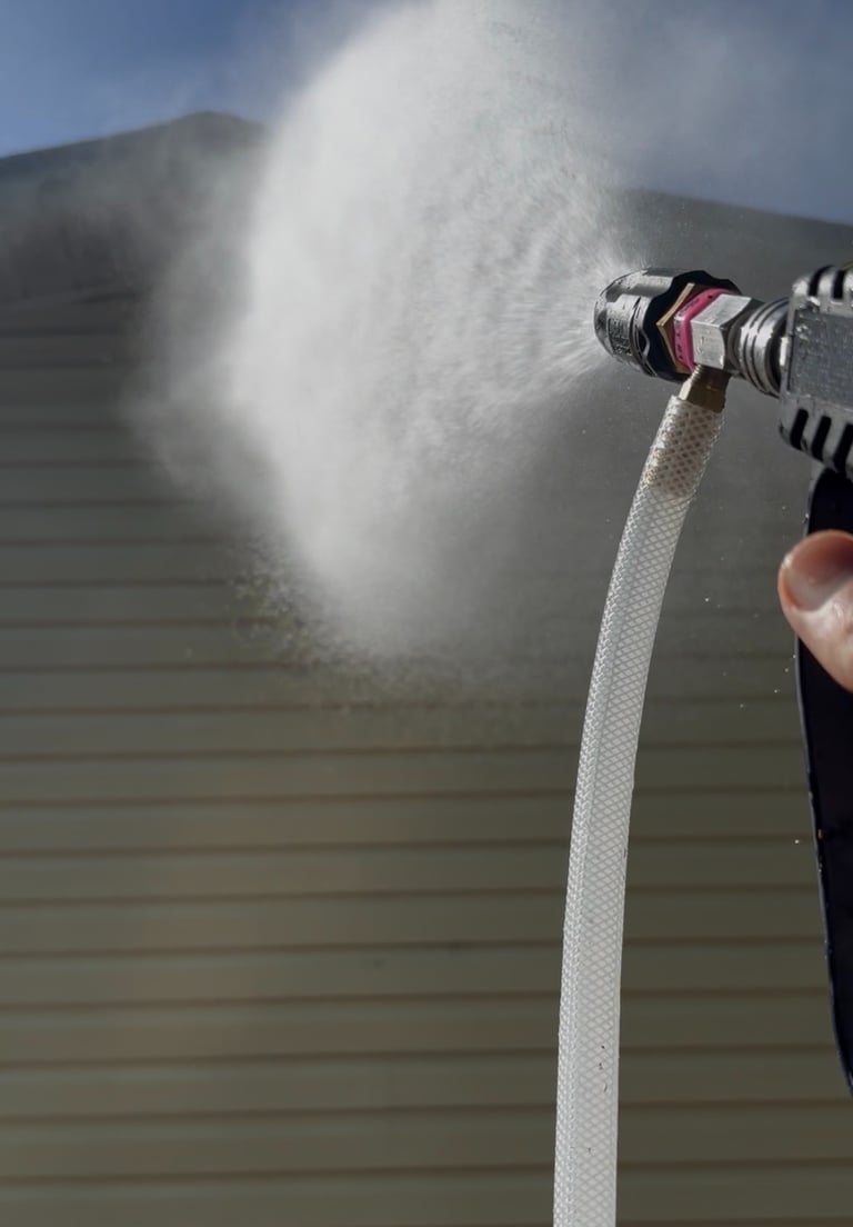 Softwashing a customers home in Obrien Florida.