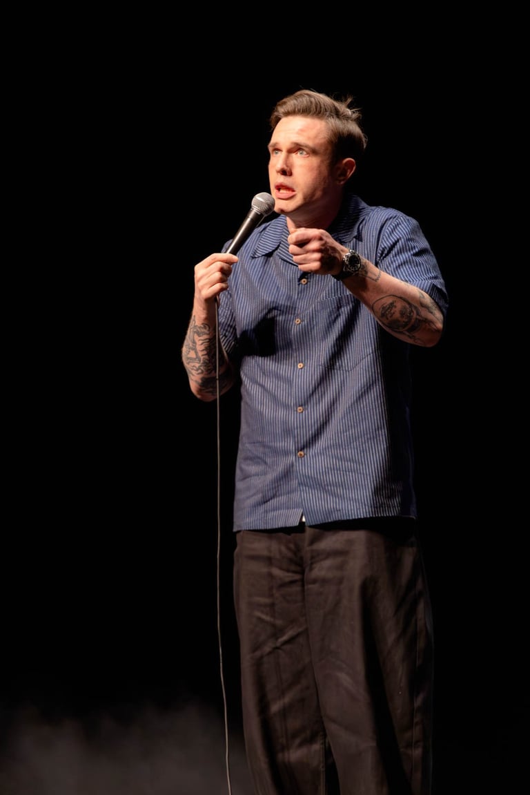 Comedian Ed Gamble performs on stage at the Richmond Theatre, London
