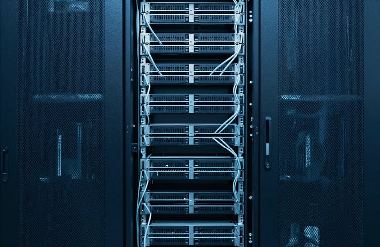 A detailed shot of a server room with Slate Blue lighting and neat cabling in a North American / US data center, symmetrical composition, cold industrial feel, high-tech reliability.
