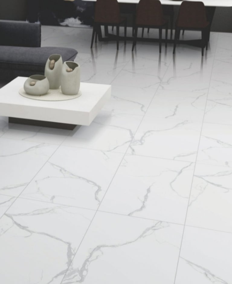 A modern living room with white marble effect floor porcelain tiles