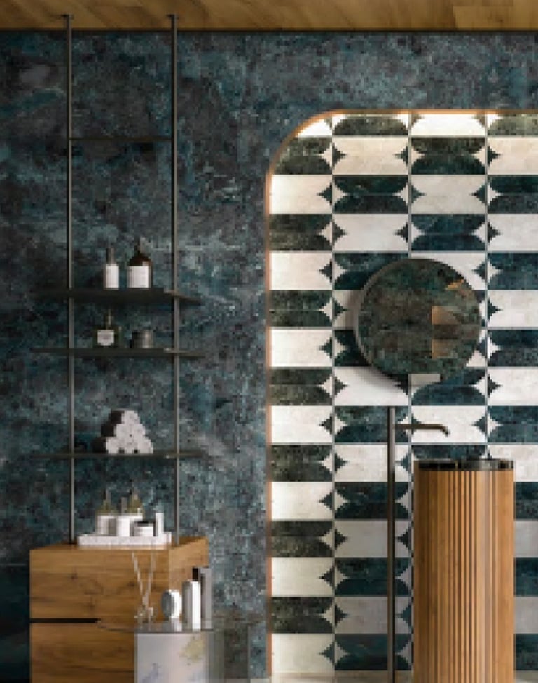 Modern bathroom with dark marble walls, geometric patterned tile, ladder shelf with toiletries, and wooden sink.