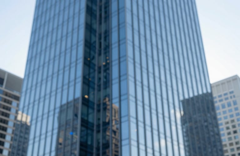 Clean and modern architectural shot of a financial district building with glass reflections of the sky, representing stability and corporate strength, featuring blue hues from the brand palette.