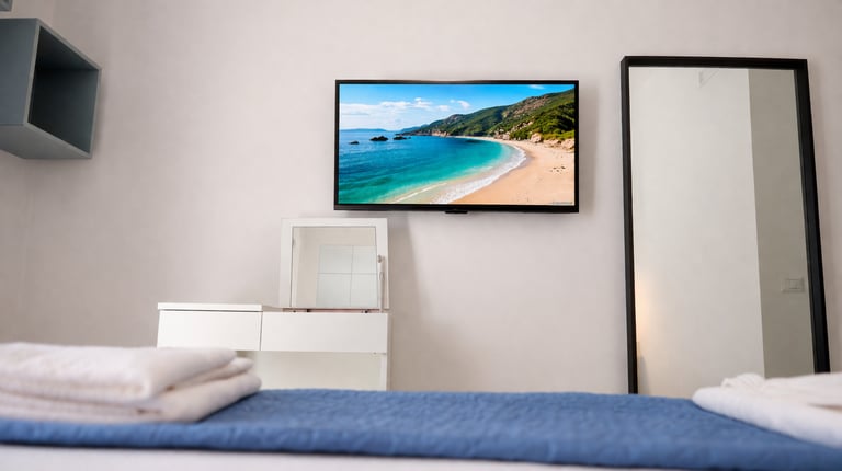 letto king camera deluxe con balcone Cirò Marina