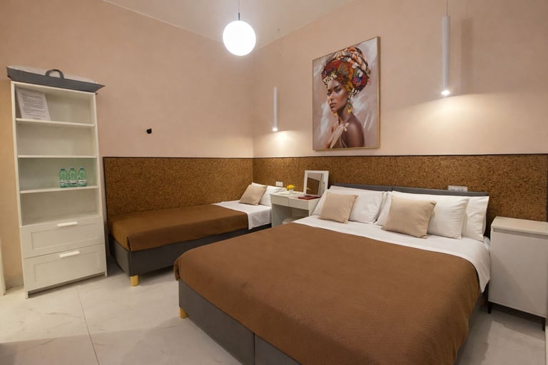 camera tripla comfort ciro marina letto queen e letto singolo il vicoletto bnb