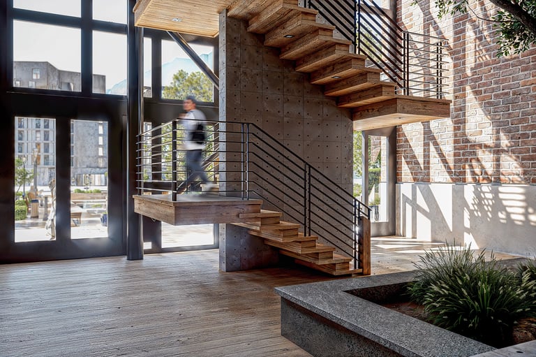 Rendu 3D ultra réaliste d’un hall avec escalier bois et métal – BenRaff Studio