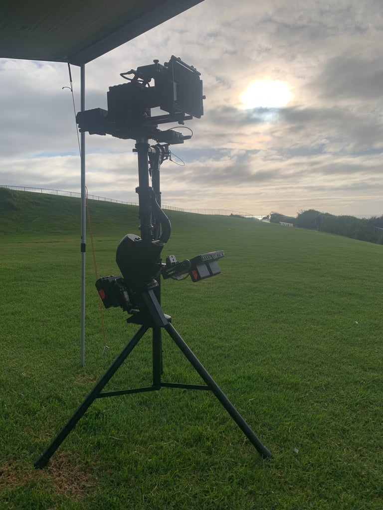 steadicam on stand on grassy hill