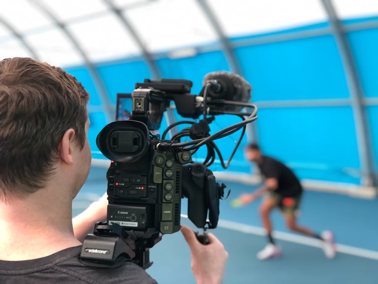 a person filming nick kyrgios