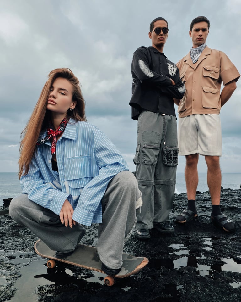 Three models with skateboard on volcanic rocks for Break the Cycle Summer 2025 Bali.