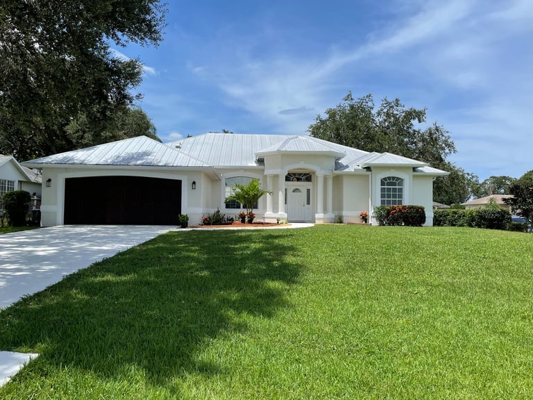 Exterior painting in Palm City FL by UTT Painting