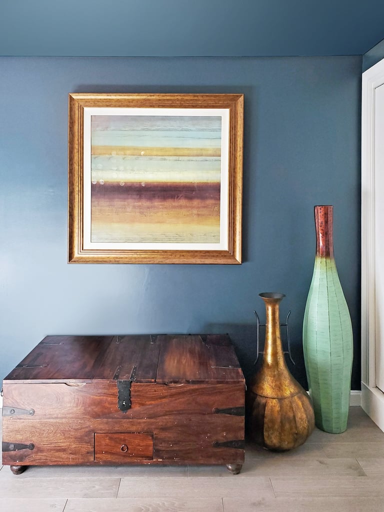 Office detail, antique family heirloom chest, decorative vases, teal wall, Medford MA Greater Boston