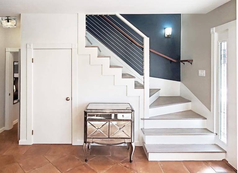 Stair hall renovation, cable railing, walnut handrail, teal accent wall, Medford MA, Erica Fossati Design