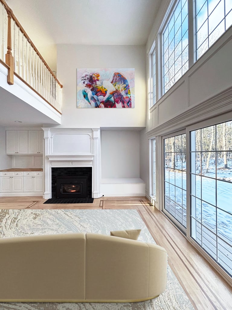 Two-story family room, curved sofa, bold print, fireplace, interior renovation Lancaster MA, Erica Fossati Design