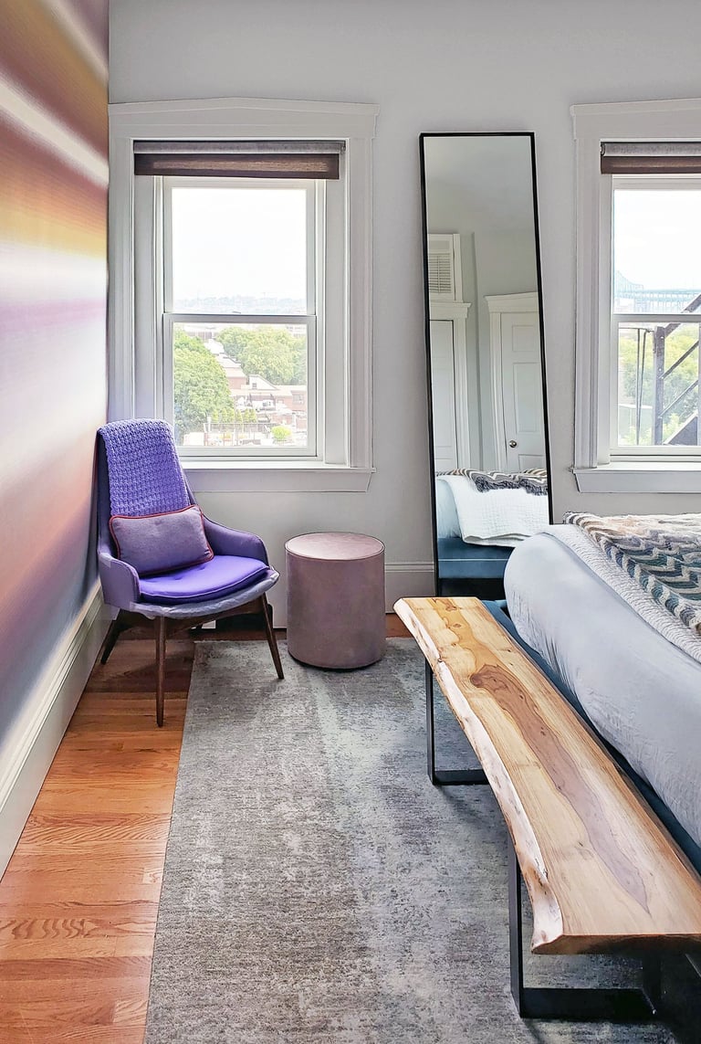 Primary suite Missoni Casa wallpaper, purple vintage chair, live edge bench, Erica Fossati Design Charlestown Boston