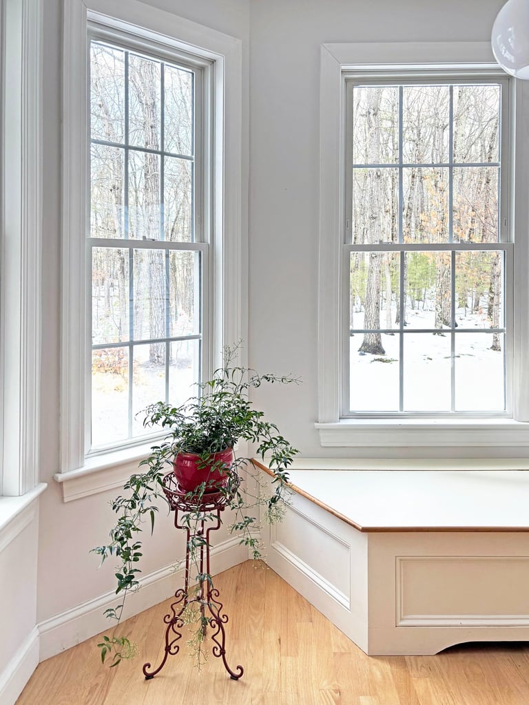 Bright breakfast room, white trim, refinished hardwood floor, interior renovation Lancaster MA, Erica Fossati Design