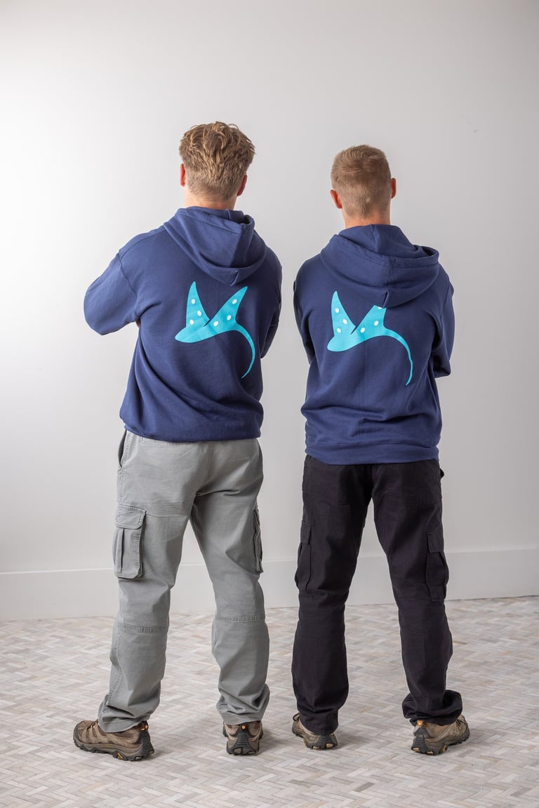 Owners of Manta Lighting Standing back to back