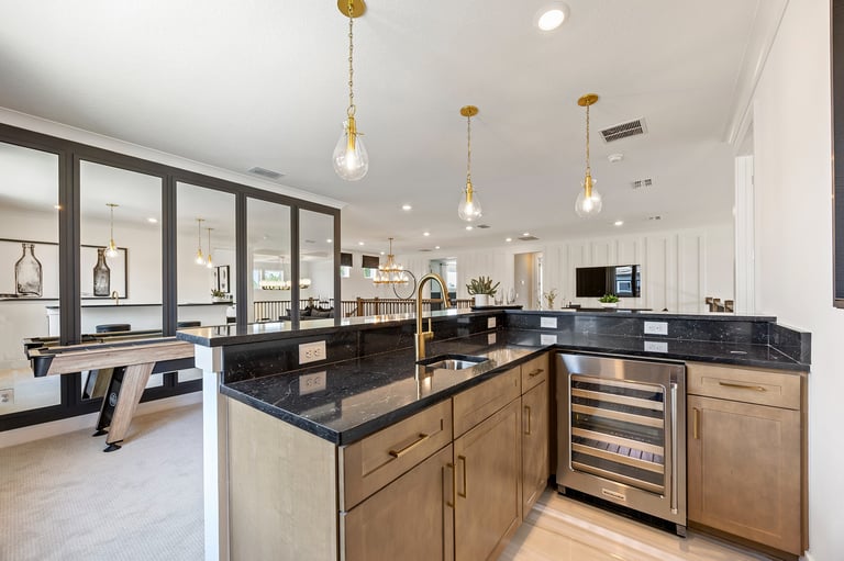 Well-lit home bonus room designed for entertaining