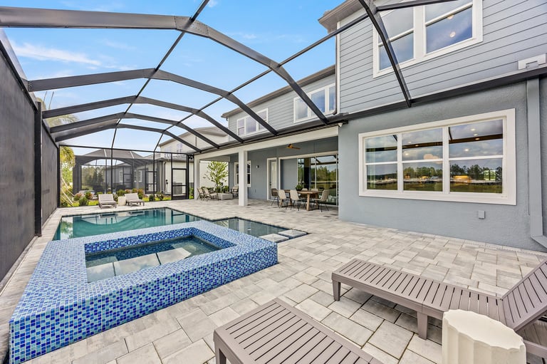 Exterior shot of suburban Tampa home with large family pool