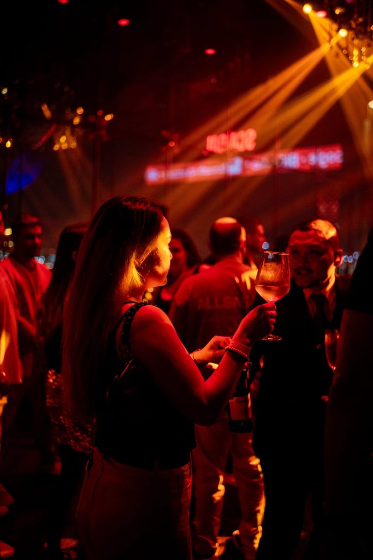 People enjoying Drinks, Hosting Dinner Show, Scandal Dubai Hilton | NBmore