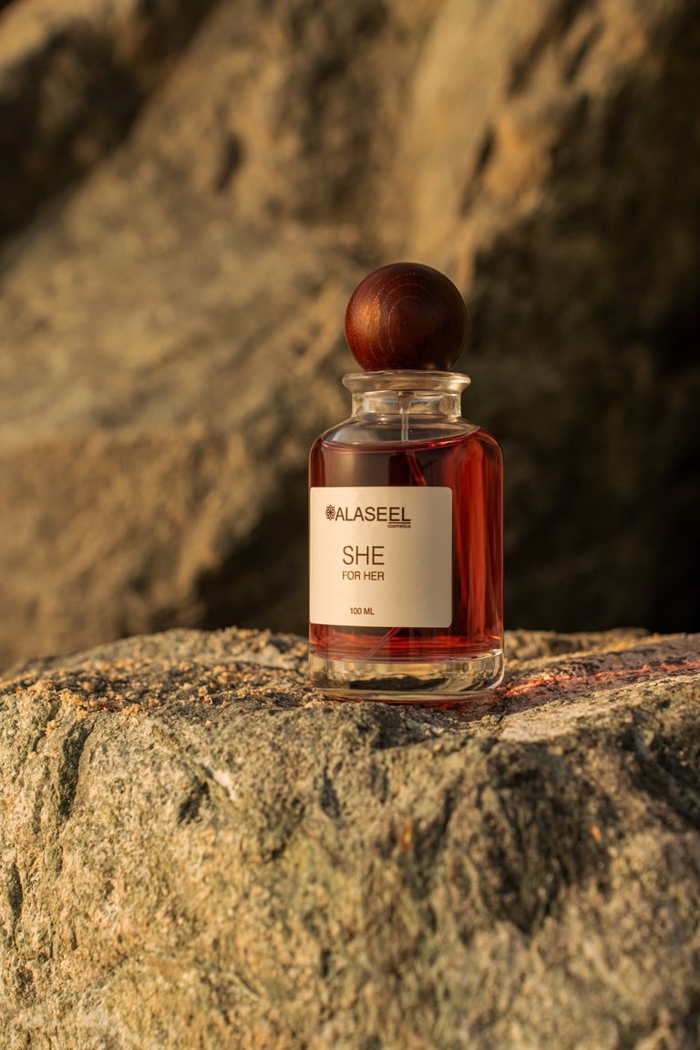 SHE fragrance on beach boulder distance shot, SHE launch by ALASEEL, Kite Beach | NBmore