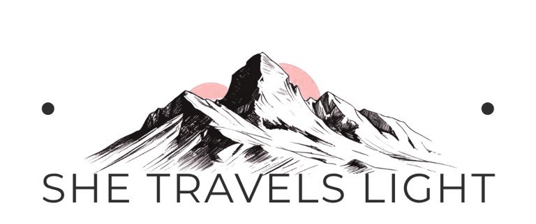 She Travels Light logo