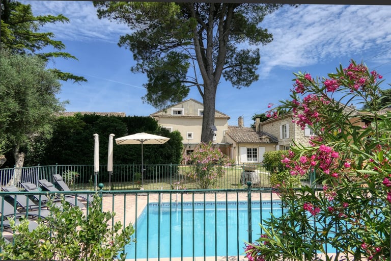 Sunny enclosed garden with outdoor pool and traditional Drôme holiday mas of l'Enclos du Soleil le Vent