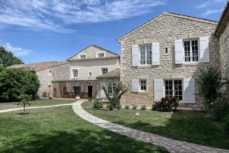 Elegant stone mas for rent in Drôme Provençale, with spacious and refined outdoor living
