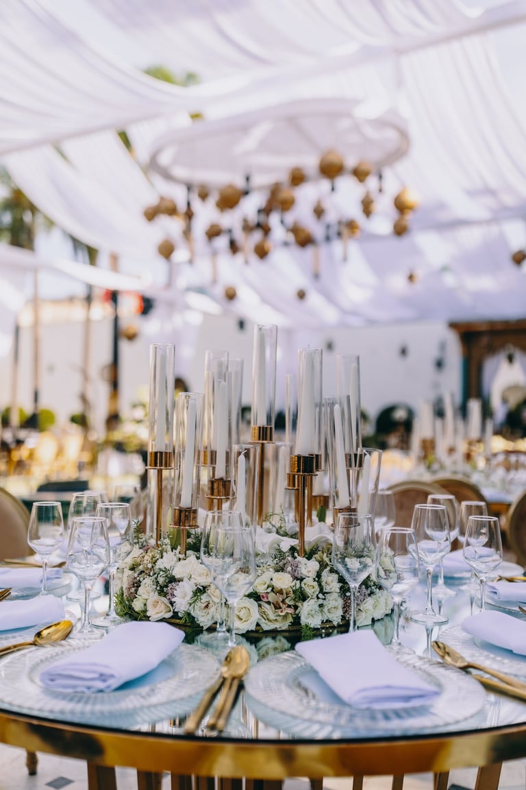table decorated with flowers and candles