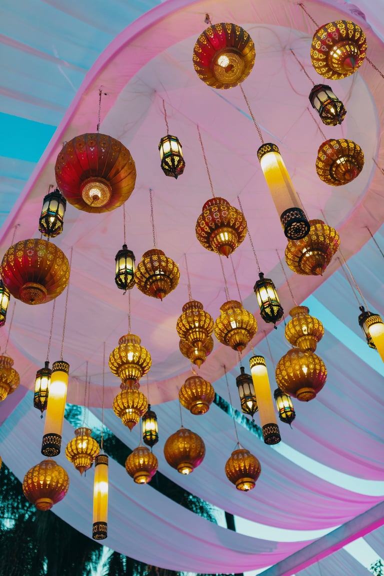 Lanterns hanging from the ceiling, glowing with purple lighting.