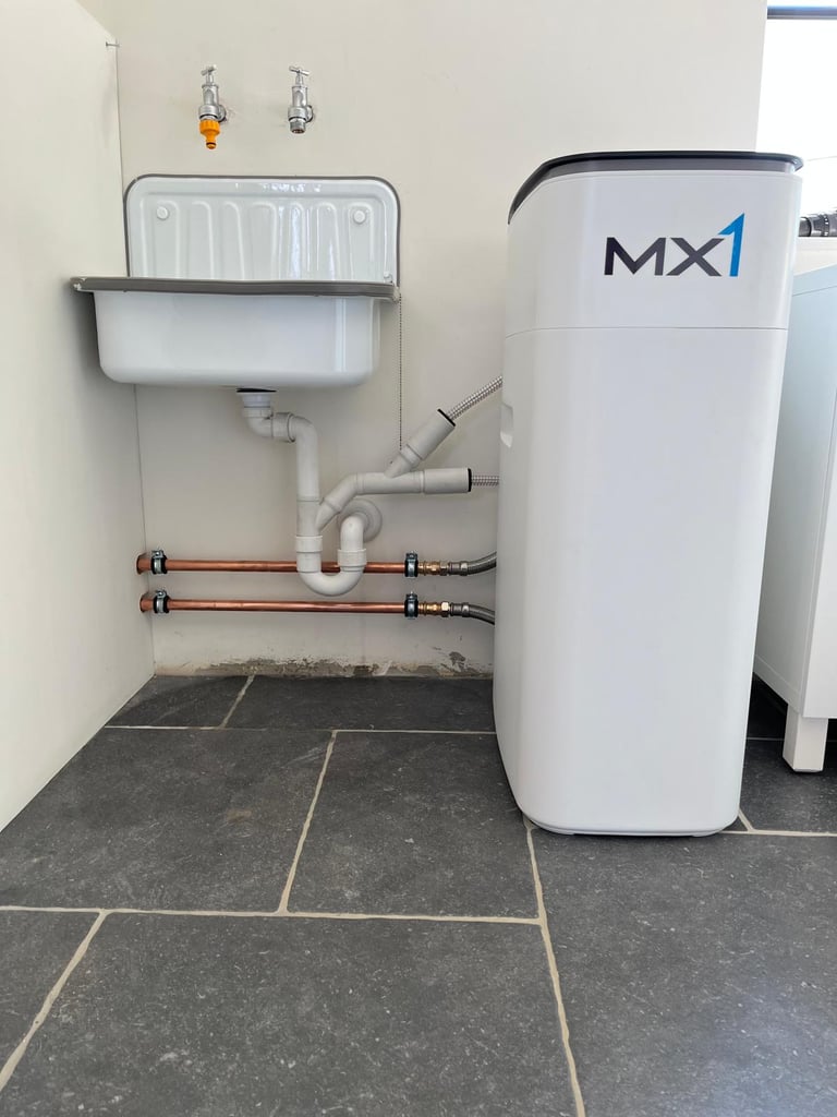 Plaatsen van waterverzachter voor kalkvrij water in woning in Leuven