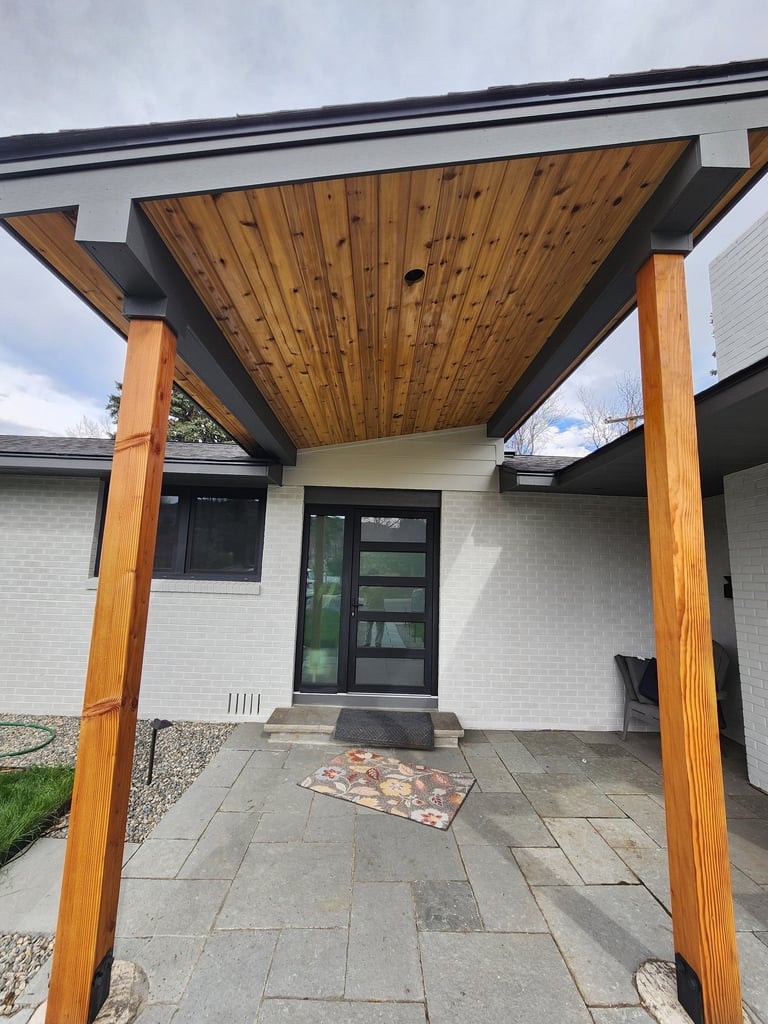 Close-up of premium exterior wood ceiling staining and prep work