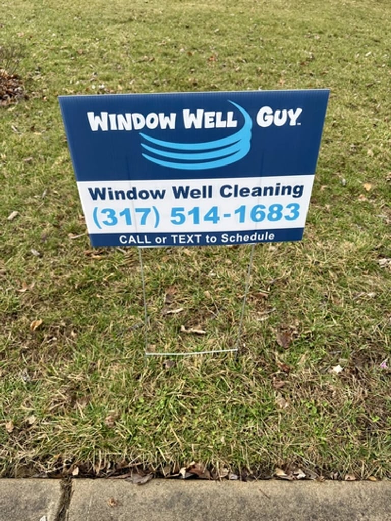 The Window Well Guy yard sign with phone number